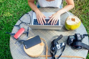 woman photographer working on laptop